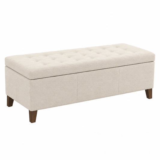 Banc de rangement rectangulaire en tissu beige avec pieds en bois